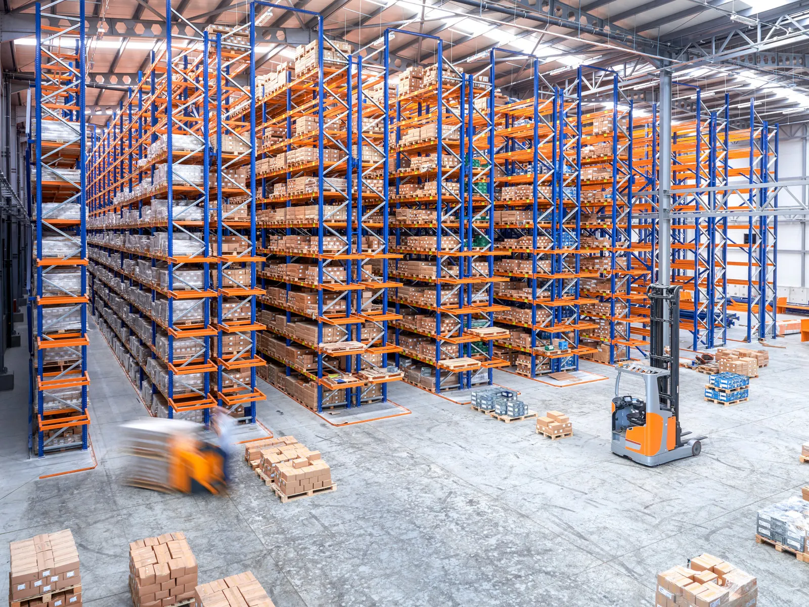 High metal racking in a large warehouse where Wi-Fi signals often drop